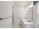 Bright bathroom with double sinks, vanity, and a walk-in shower at 743 Anderson St, Charlotte, NC 28205