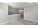 Bonus room with carpet flooring and plenty of neutral light at 743 Anderson St, Charlotte, NC 28205