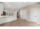 Modern kitchen with white cabinets, stainless steel appliances, and hardwood floors at 743 Anderson St, Charlotte, NC 28205