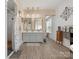 Well-lit bathroom featuring a double vanity, walk-in shower, and stylish decor at 925 Hamilton Rd, Chester, SC 29706