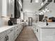 Contemporary kitchen featuring white cabinets, a large island, and stainless steel appliances at 925 Hamilton Rd, Chester, SC 29706