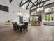 Spacious open-concept layout with high ceilings, wood beams, and stylish finishes throughout the dining and kitchen areas at 925 Hamilton Rd, Chester, SC 29706