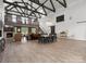 Bright and airy living room features a high ceiling with wood beams, a fireplace, and an open layout at 925 Hamilton Rd, Chester, SC 29706