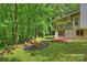 Charming backyard sitting area with chairs, perfect for relaxation and enjoying the peaceful surroundings at 9520 Squirrel Hollow Ln, Charlotte, NC 28270