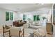 Basement featuring light wood floors, recessed lighting, and stylish seating area at 9520 Squirrel Hollow Ln, Charlotte, NC 28270