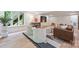 Finished basement featuring light wood floors, recessed lighting, and stylish seating at 9520 Squirrel Hollow Ln, Charlotte, NC 28270