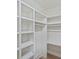 Spacious walk-in closet with ample shelving and hanging space, providing plenty of storage at 9520 Squirrel Hollow Ln, Charlotte, NC 28270