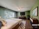 Bedroom with modern furniture, ceiling fan, and a large window at 10319 Willingham Rd, Huntersville, NC 28078
