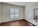 Office space with hardwood floors, french doors, and a large window at 10319 Willingham Rd, Huntersville, NC 28078