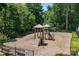 Neighborhood playground with climbing wall, slide, and swings for Gathering enjoyment at 10327 Shelter Rock Ct, Charlotte, NC 28214