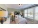 Cozy bedroom with natural light and decorative headboard at 106 Noah Ln, Troutman, NC 28166