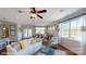 Comfortable living room with ample natural light and an adjacent dining area at 106 Noah Ln, Troutman, NC 28166