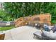 Backyard featuring an above ground pool, well maintained concrete, and a wooden patio at 107 Oakland Rd, Belmont, NC 28012