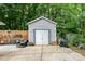 Backyard with a detached garage, outdoor seating, and patio space at 107 Oakland Rd, Belmont, NC 28012