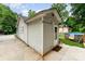 Home exterior featuring neutral siding, a grassy yard, and an above ground pool at 107 Oakland Rd, Belmont, NC 28012