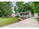 Charming single Gathering home with a beautiful front yard and a private driveway at 107 Oakland Rd, Belmont, NC 28012