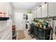 Functional laundry room with washer, dryer, and ample storage space, and back door at 107 Oakland Rd, Belmont, NC 28012