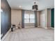 Expansive bonus room featuring neutral walls, carpeted floors, and modern lighting at 114 Reserve Ln, Fort Mill, SC 29707