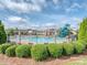 Community pool with slide and splashpad features, and surrounding lounge area at 114 Reserve Ln, Fort Mill, SC 29707