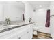 Bathroom with granite countertops, modern fixtures, white cabinets, and a shower-tub combination with a purple curtain at 1218 Rosada Dr, Charlotte, NC 28213