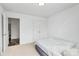 Neutral bedroom with an interior view, showcasing a comfortable and simple design at 1218 Rosada Dr, Charlotte, NC 28213