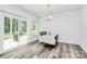 Bright dining area with sliding glass doors leading to an outdoor patio, ideal for entertaining at 1218 Rosada Dr, Charlotte, NC 28213