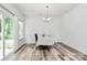 Cozy dining room area bathed in natural light, perfect for Gathering meals and gatherings at 1218 Rosada Dr, Charlotte, NC 28213