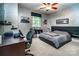 Trendy bedroom with sleek furnishings, modern decor, and a gamer-friendly setup at 122 Sleepy Cove Trl, Mooresville, NC 28117
