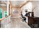 Upstairs landing area with built-in desk, custom cabinets and staircase at 122 Sleepy Cove Trl, Mooresville, NC 28117