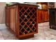 Close up of a wooden wine rack with multiple wine bottles at 122 Sleepy Cove Trl, Mooresville, NC 28117