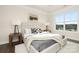 Serene main bedroom featuring a plush bed, large window, and tasteful decor at 125 Noah Ln, Troutman, NC 28166