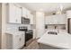 Kitchen with stainless appliances, white cabinets, and a kitchen island at 13221 Gadwal Pintail Dr, Charlotte, NC 28262