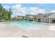 Community pool featuring a large swimming area with a clubhouse and seating at 13221 Gadwal Pintail Dr, Charlotte, NC 28262