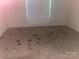 The bedroom is empty and does have some stains throughout the room on the walls and carpeted flooring at 1381 Steven Dr, Salisbury, NC 28147