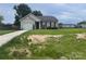 Charming single-story home with attached garage and well-maintained lawn with some hay spread out on the front yard at 1381 Steven Dr, Salisbury, NC 28147
