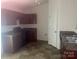 The kitchen has wooden cabinets and a double bowl sink at 1381 Steven Dr, Salisbury, NC 28147