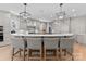 Spacious kitchen featuring a large island, pendant lighting, and modern appliances, perfect for entertaining at 1550 Queens W Rd, Charlotte, NC 28207