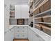 Well-organized pantry with custom shelving and ample storage space for all your kitchen essentials at 1550 Queens W Rd, Charlotte, NC 28207