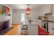 Bright kitchen featuring modern appliances, a spacious island, and stylish finishes, perfect for cooking and entertaining at 1567 Jennings Rd, Statesville, NC 28625