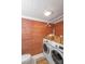Functional laundry room with modern appliances, ample storage, and neutral tones, making chores more convenient at 1567 Jennings Rd, Statesville, NC 28625