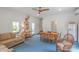 Bright living room with a dining area, comfortable couch, and stylish decor at 1567 Jennings Rd, Statesville, NC 28625