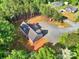 Aerial view of home and trees with a large driveway at 1811 Continental Dr, Albemarle, NC 28001