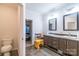 Bathroom includes double sinks, a toilet area, and modern fixtures at 1811 Continental Dr, Albemarle, NC 28001