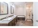 Bathroom features double sinks, soaking tub, and walk-in shower for spa-like relaxation at 1811 Continental Dr, Albemarle, NC 28001
