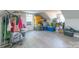 Bonus room with light laminate floors, neutral walls and full of storage and bins at 1811 Continental Dr, Albemarle, NC 28001