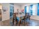 Cozy dining space featuring wood-look floors and a view of the laundry area at 1811 Continental Dr, Albemarle, NC 28001