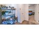 Practical entryway with shoe storage and view to a bedroom at 1811 Continental Dr, Albemarle, NC 28001