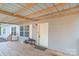 Inviting covered front porch featuring wood flooring and space for seating and decor at 1811 Continental Dr, Albemarle, NC 28001