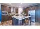 Stylish kitchen with a center island, stainless steel appliances, and modern cabinetry at 1811 Continental Dr, Albemarle, NC 28001