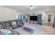 Open-concept living room with access to the dining area and kitchen, perfect for entertaining at 1811 Continental Dr, Albemarle, NC 28001